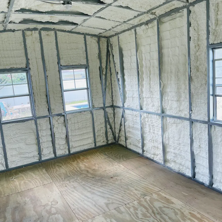 Closed-cell spray foam insulation applied to wall cavities in a residential project in Lake Bluff